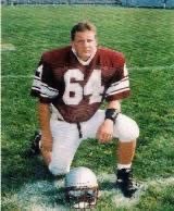 Chad wearing his number 64 football uniform